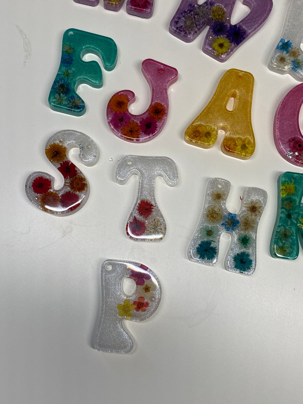 Handmade in custom designed resin keychains